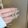 Exquisitos pendientes largos cortos con borlas incrustados de perlas y diamantes para mujer diseño de nicho de lujo ligero pendientes de lazo amor