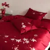 Elegante y festivo juego de cuatro piezas 100S de algodón de fibra larga en color rojo brillante para recién casados, ropa de cama de algodón puro para un matrimonio feliz