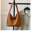 2025 Nuevo Bolso de Mano Retro de Gran Capacidad de Moda Bolso de Hombro Versátil Casual Bolso Tote Tipo Cubo para Viaje