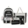 Conjunto de mochila de cinco peças para ensino fundamental e médio, bolsa de ombro dupla para estudantes de grande capacidade, mochila casual com blocos de cores simples e elegante para mulheres