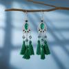 11 aretes de borlas de 1 color de alta gama 2025 aretes nacionales europeos y americanos al por mayor aretes con forma de calabaza