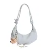Bolso de mano de nicho de lujo ligero para mujer, nuevo modelo primavera 2026, bolso cruzado de un solo hombro versátil y elegante