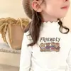 Camiseta de Manga Larga para Niña Otoño/Invierno 2026 Estilo Nuevo Camiseta Térmica de Forro Polar para Niños Medianos y Grandes, Cuello Semi Alto, Adorno de Volantes