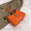 Bolsa de Design de Nicho Coreana para Mulheres Verão 2025 Nova Textura Bolsinha de Mão de Braço Versátil Bolsa de Ombro Fashion