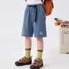 26 Modelos Nuevos de Shorts Casuales Transpirables Sueltos de Verano para Niños Mayores, Directo de la Fábrica Fuente