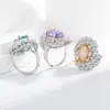 Anillo de Flor de Hielo con Gema de Color Brillante de Corte Huevo de Paloma Oversize de Venta Caliente Transfronteriza para Mujer Moda Europea y Americana Joyería de Diamante de Alto Carbono Brillante