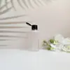 Garrafa de plástico transparente com tampa flip 100 120 200 250 500ml garrafa branca para cosméticos tampa borboleta