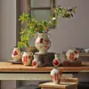 Jarrón de Cerámica de Jingdezhen Adornos Arreglo Floral para Sala de Estar Flor de Ciruelo Pintada a Mano Retro Festival de Primavera Mesa Decorativa para Sala de Estar