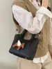 Bolsa Transversal de Ombro Único Estilo Novo Inverno 2026, Textura Simples e Fashion, Design de Nicho, Bolsa Saco Casual Feminina