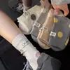 26 Estilos Nuevos de Calcetines para Mujer para Primavera y Verano, Hechos de Algodón Peinado, de Longitud Media hasta la Pantorrilla, con Lunares Grandes, Etiqueta de Tela Colorida en el Talón y Calcetines Holgados