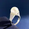 Anillo Grande de Perla Elegante y Exquisito Estilo Coreano Diseño de Nicho Lujo de Entrada Cobre con Circonita Chapado en Platino Anillo para Comer en Vivo