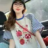 Camiseta de Manga Corta Raglán con Bloques de Color a Cuadros Azules para Mujer, Verano 2026, Estampado de Dibujos Animados Único y Exquisito, Corte Holgado, Top Favorecedor