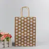 En stock Suministro Punto Grande Ola Fiesta de Navidad Empaque de Regalo Bolsa de Papel Kraft Portátil Amazon Duoduo Transfronterizo