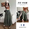 Falda de Mezclilla con Abertura para Mujer Otoño e Invierno 2025 Nueva Cintura Alta Diseño Delgado Línea A Recta Longitud Media