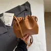 Bolso de mujer de alta gama 2026 nuevo de moda primavera-verano popular bolso de hombro axila bolso de cubo cruzado exquisito para el trabajo