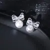 Aretes de Perla con Moño Incrustado de Circonita Estilo Coreano Nuevo Estilo Pendientes de Venta Caliente Diseño de Nicho Pendiente Versátil de Gama Alta