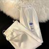 Fabricante original pantalones de gofre para hombre sueltos pierna ancha rectos deportivos casuales combinan con todo retro pantalones de punta hombre