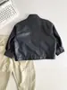 Valle del Viento 2026 Otoño Nueva Chaqueta de Cuero para Motocicleta Estilo Coreano Elegante para Niños y Niñas Chaqueta Versátil de Primavera y Otoño con Cuello Alto para Niños