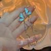 Elegantes pendientes de borla de perla y mariposa para mujer, diseño de nicho, largos, personalizados, ligeros, de lujo, únicos, joyería de celebridades de Internet.