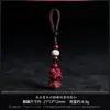 Artículos genuinos cinnabar morado arena dorada año del Kirin Dragón llavero para hombres y mujeres colgante año animal colgante de coche fábrica de joyería