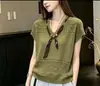 Blusa de punto transpirable de verano, hermosa, adelgazante, versátil, con corbata de bufanda de seda, manga corta abullonada hueca de seda helada