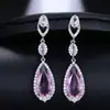 Pendientes de temperamento de moda europea y americana, pendientes largos grandes de circonita en forma de gota, pendientes femeninos hermosos y simples de la calle Ruili, ventas directas de fábrica