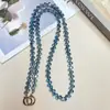Elegante bolso nuevo de cadena cruzada para teléfono con cristal de gota de agua multicolor ultrabrillante y cadena larga para llevar en la espalda