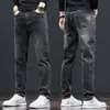 Jeans Masculino 2025 Outono e Inverno Nova Marca de Moda Versátil Elegante Elástico Casual Calça Longa Masculina Reta Slim Fit