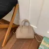 Bolsa Pequena de Concha Exquisita Estilo Coreano Nicho Nova Primavera 2026 Textura Simples de Mão Bolsa de Ombro Transversal