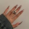 Moda Europea y Americana Anillo de Acero de Titanio Normcore Personalizado Anillo de Pareja con Forma de Gota Diseño de Nicho Anillo Elegante para Mujeres