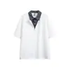 Yidao Vintage 2026 Verano Nuevo Retro Americano Moderno Cuadros Falso Dos Piezas Patchwork Cuello Polo Holgado Manga Corta