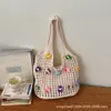 Bolsa de Ombro Tecida Vazada para Axila Feminina 2026 Novo Estilo Bolsa de Tricô Flor de Lã Grande Capacidade Bolsa Tote de Ombro