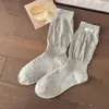 Calcetines coreanos grises con patrón de huevo para primavera y otoño, sin costuras, de burbujas, hasta la mitad de la pantorrilla, calcetines de linterna JK adelgazantes, calcetines largos apilados estilo universitario