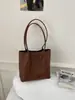 Bolsa com senso de design de moda transfronteiriço feminina nova textura tecida retrô bolsa tote bolsa mãe-filho grande capacidade bolsa de ombro único sob o braço