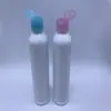 Fabricante en stock botella de plástico transparente PET de 250 ml botella de hombro redondo botella de tinta botella de boca puntiaguda botella con tapa de spray