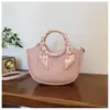 2026 Bolso de Mujer de Alta Calidad Nueva Moda Simple Versátil Bolsa de Comercio Exterior Hombro Único Viajero Diseño de Nicho Bolso Cruzado