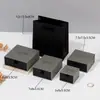 Cajas de joyería de papel reciclado del fabricante en stock con textura clara para anillos, collares y pulseras