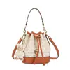 Bolsas de Diseño de Nicho Transfronterizas para Mujer Estilo Nuevo 2026 Bolso Cubo con Cordón de Monograma Bolso Cruzado de Hombro Único de Alta Gama para Mujer