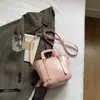 Bolso de Mano para Mujer Moderno y Sencillo 2026 Primavera Nuevo de Moda Elegante Color Sólido Bolso Cruzado Tipo Cubo