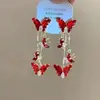 Aretes Largos Super Hada Mariposa Rojo Sangre con Borlas de Mariposa, Versátiles y Únicos, Aretes de Esmalte de Lujo Ligero que Realzan el Cutis