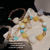 Método antigo água dourada espuma jade pulseira de cintura entrelaçada Ji Bao noz marfim amor pulseira multi tesouro