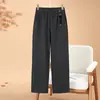 Pantalones de lana casuales y a la moda para mujeres de mediana edad y mayores, nuevo estilo otoño 2026, cintura elástica, adelgazantes y favorecedores, pantalones de pierna recta para madres
