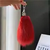 Llavero de coche de piel de zorro, colgante para bolso de piel auténtica, adorno colgante de peluche, decoración de cola linda, accesorio de llavero personalizado y elegante