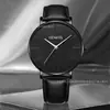 Nuevo estilo de comercio exterior: un juego de reloj de correa de cuero para hombre, simple y elegante, con un reloj de cuarzo moderno y casual, fabricado por una compañía de relojes