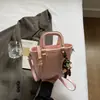 Bolso de Mano para Mujer Moderno y Sencillo 2026 Primavera Nuevo de Moda Elegante Color Sólido Bolso Cruzado Tipo Cubo