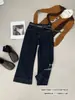 Otoño TOP Estilo Europeo Guangzhou Trece Filas Originales Jeans Capri de Mezclilla Antidescoloración Elásticos de 8 Puntos con Cinturón 82616