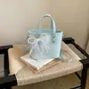 Bolsa de Mão da Moda com Design de Nicho Estilo Coreano para Mulheres 2026 Novo Modelo Bolsa de Ombro Texturizada Bolsa Transversal Simples Doce Estilo Balde