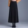 Elegante y minimalista falda midi de lana línea A, nueva colección otoño/invierno 2026, de cintura alta, estiliza y cubre la cadera, adecuada para ropa de trabajo