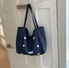 Bolso floral simple y artístico versión coreana 2026, bolso cruzado plisado fresco y delicado estilo bosque, bolso de hombro casual y relajado para ir al trabajo