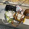 Bolsa tote redonda em bloco de cores estilo macaron coreano para atacado transfronteiriço, bolsa Boston tipo balde, bolsa transversal casual de ombro único para mulheres